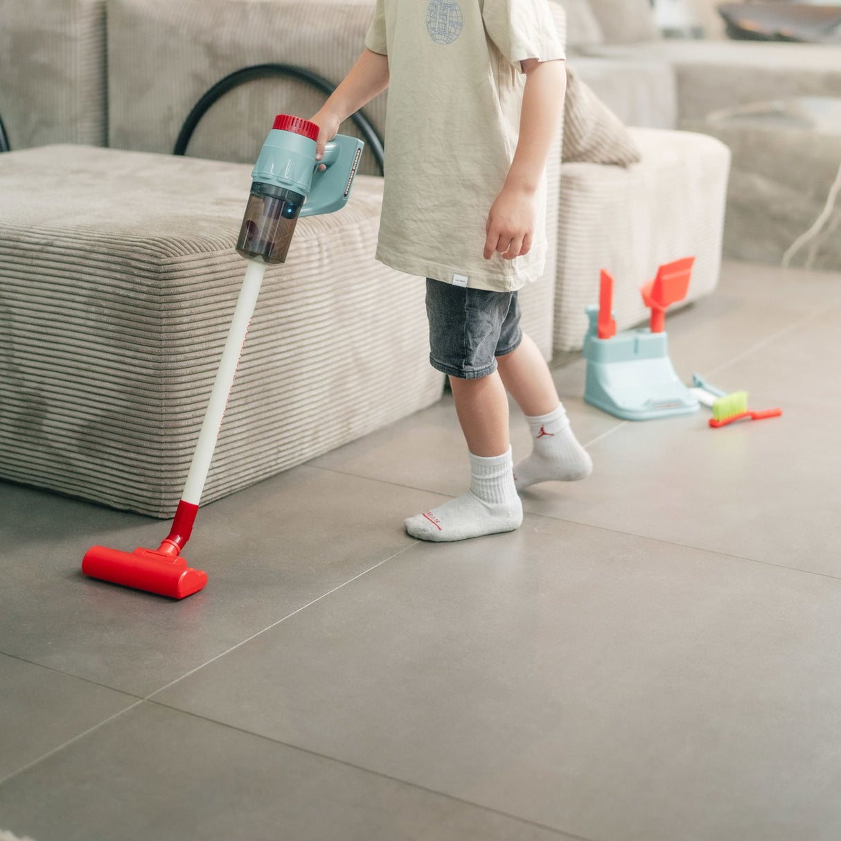 Legetøjsstøvsuger med lys og lyd