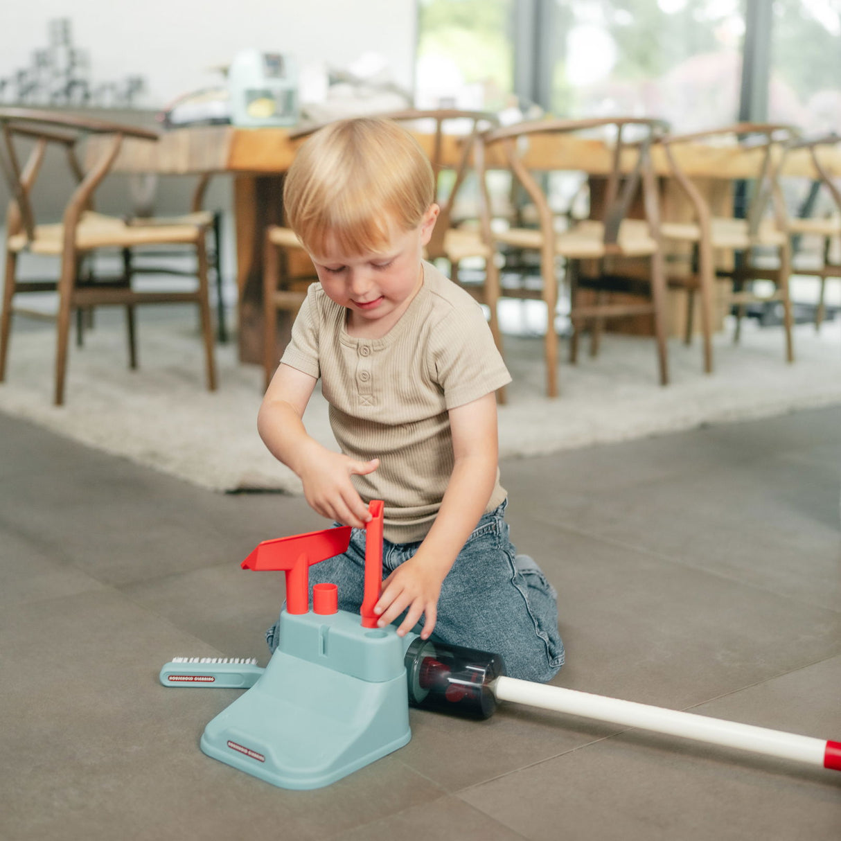 Legetøjsstøvsuger med lys og lyd