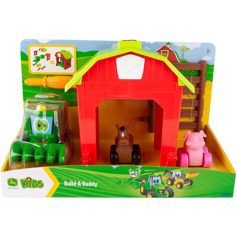 John Deere bondegaard med mejetærsker, gris og ko på hjul.