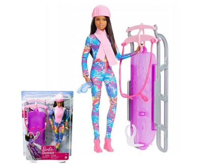 Barbie dukke i flyverdragt med kælk