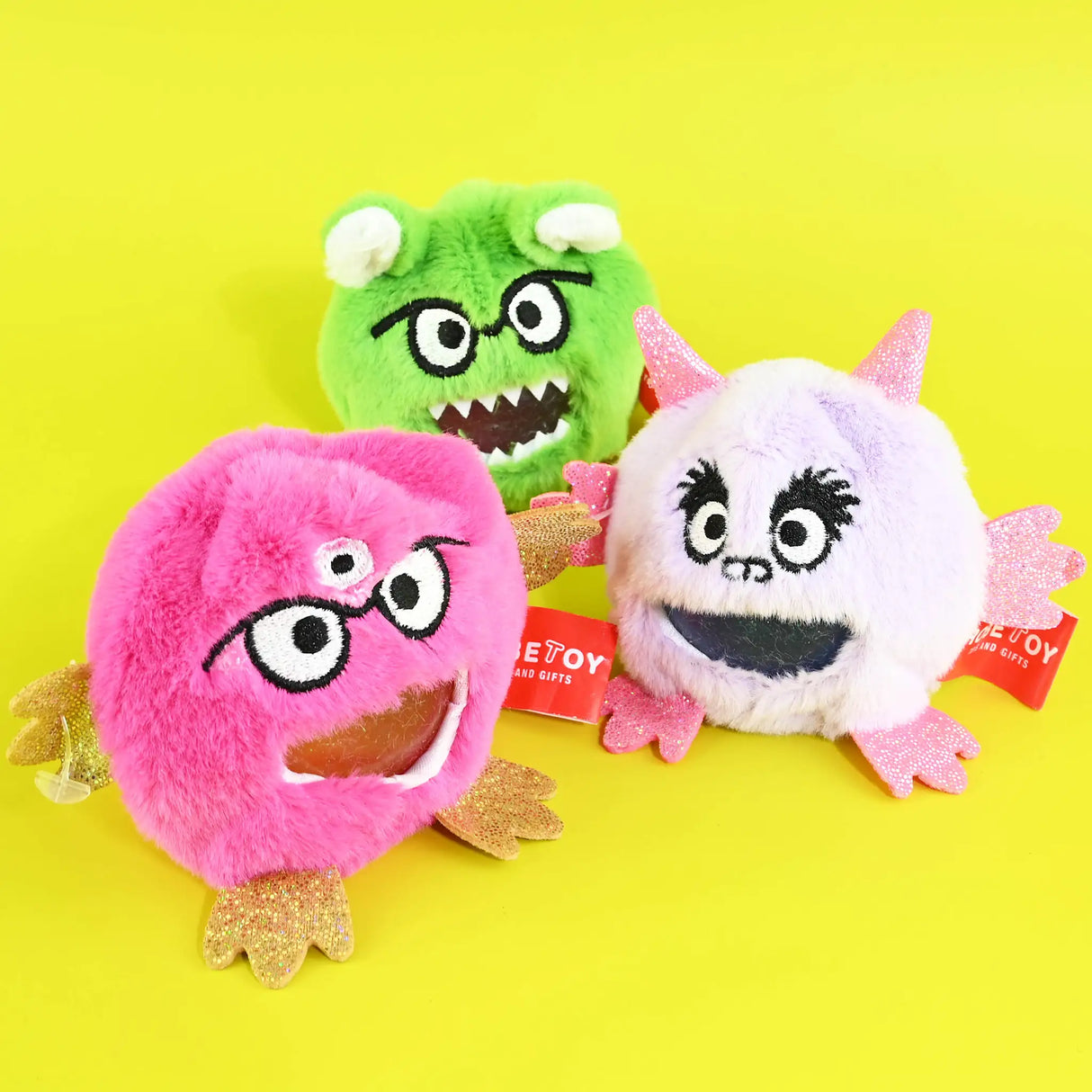 Squishy plush monster glitter